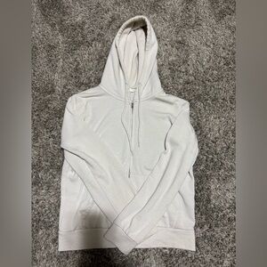 Reflex, white, medium in men’s but runs small